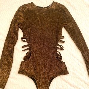 Shimmer Fashion Nova Bodysuit with cut out sides